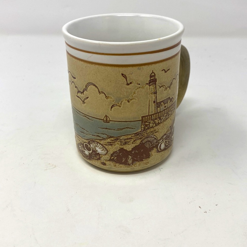 Vintage souvenir travel brown embossed coffee mug